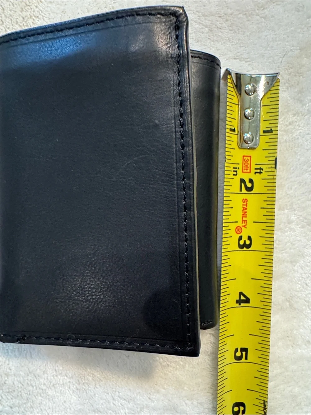 NWOT Lord & Taylor black leather tri-fold wallet.